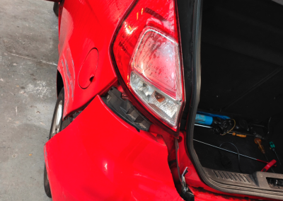 Red car bumber broken