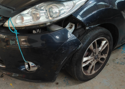 Black car bumber damaged
