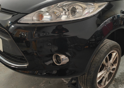 Black car bumoer fixed and painted