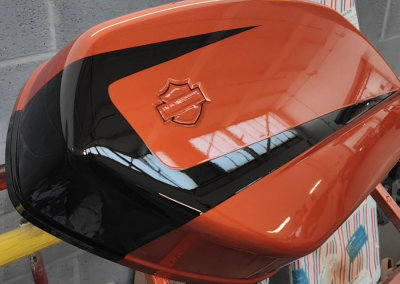 Motorbike side luggage mostly painted