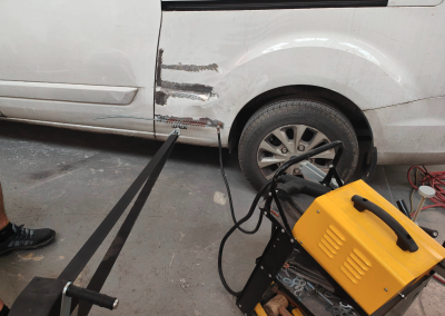 White Van dent being pulled 2